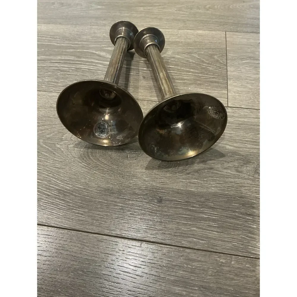 other silverplated candlestick